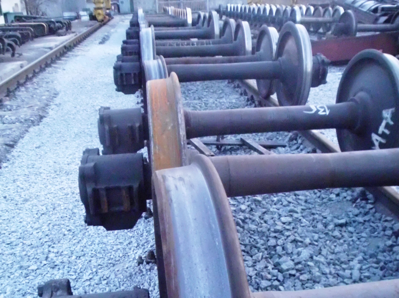 Essieux ferroviaires — portées de roulement et de calage